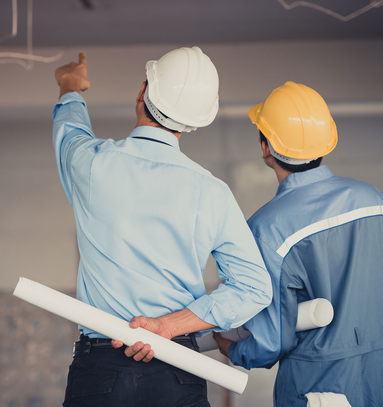 Contractors looking over a work site