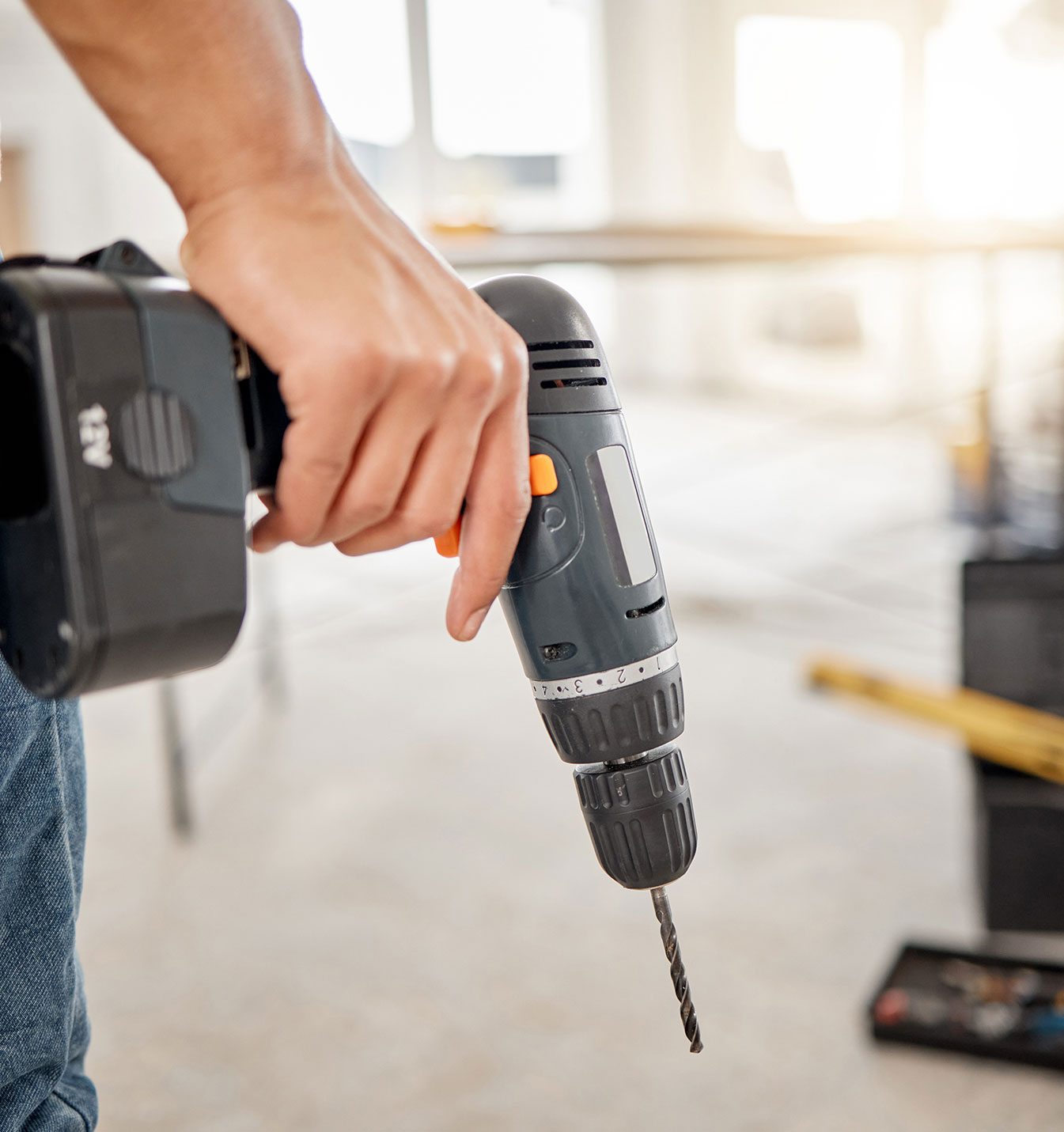 Gentleman walking with a drill