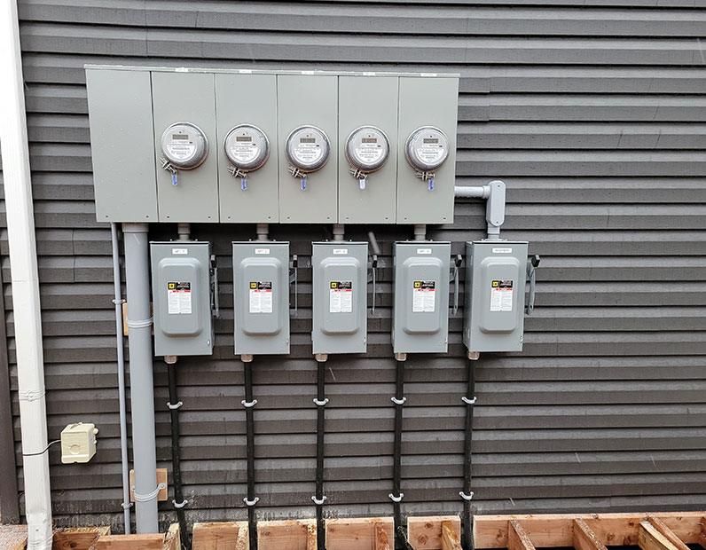 electrical boxes on the outside of a building