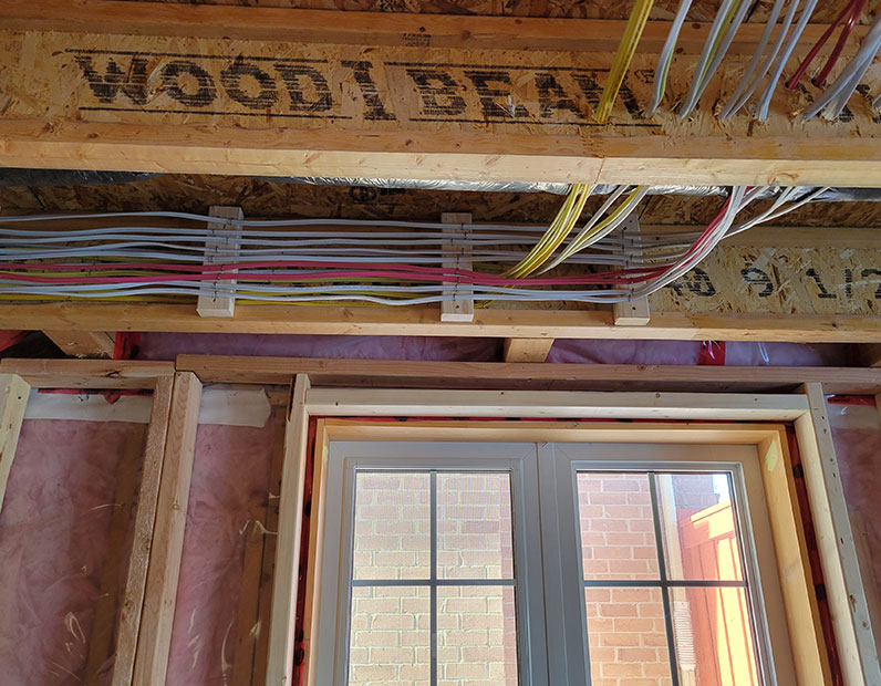 Wiring perfectly lined up throughout the ceiling